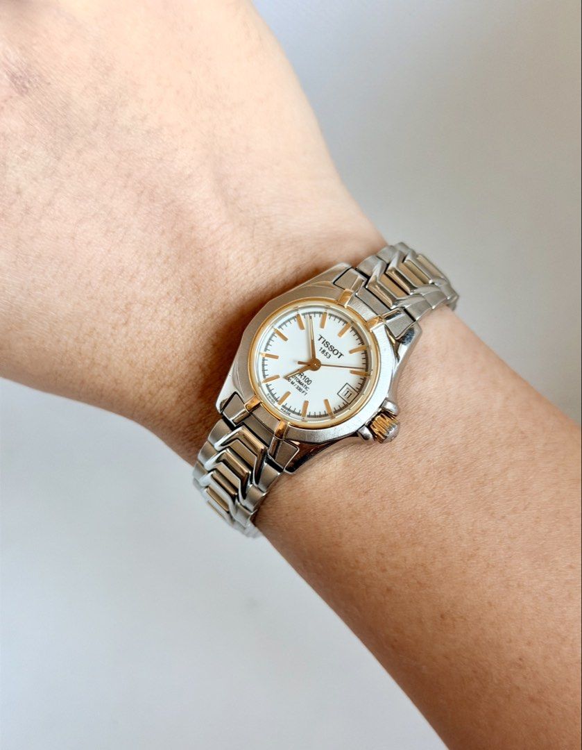 Tissot PR 100 Automatic (Category: Women's Watches) located in Manila. Submitted by vibeandvintage (Listing ID 1468603615, Image 2). Description: ⌚️ Tissot PR 100 Automatic •Ladies •Automatic movement •White dial •Two-tone stainless steel and gold plated accents •24mm case diameter (excluding crown) •Up to 6.8 inches wrist size •Original watch head and bracelet •With signs of usage •Good working condition •Unit only — no papers •Comes with a pres