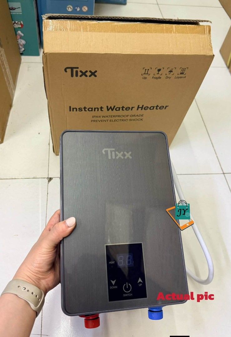 Tixx Basic Model Instant Water Heater Grey (Category: Water Heater & Instant Showers) located in Taguig. Submitted by diannecaya86853 (Listing ID 1468596829, Image 3). Description: Tixx electric water heater 5500w.