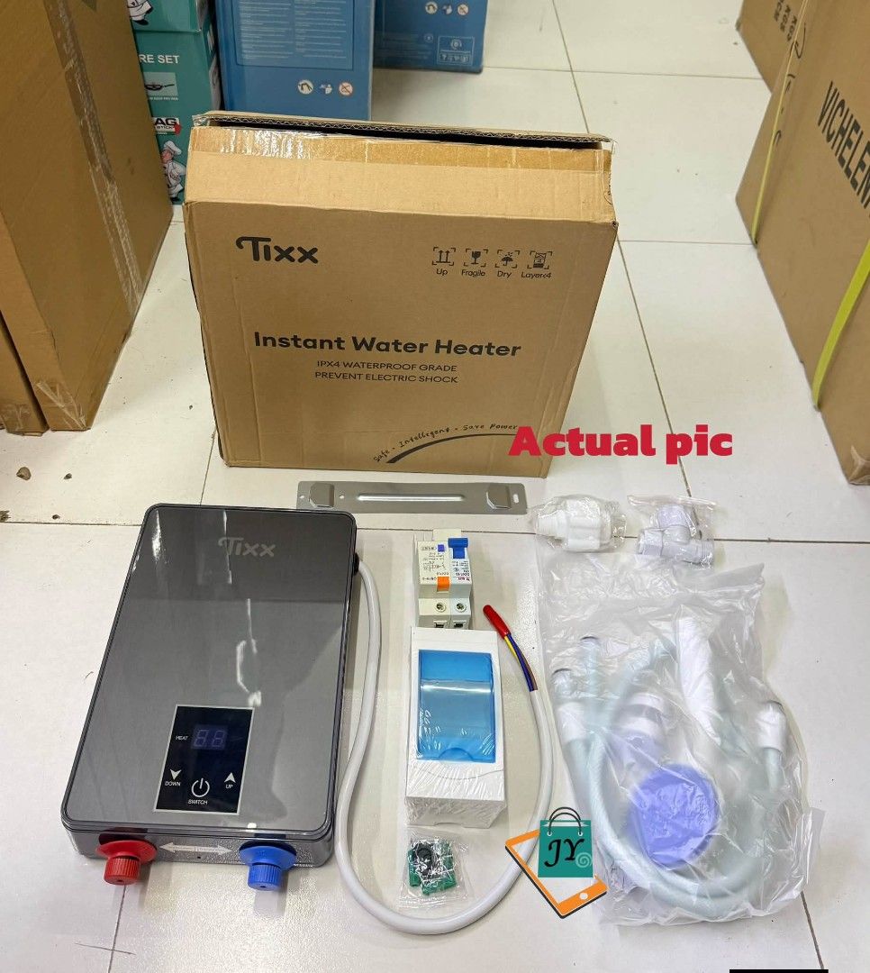Tixx Basic Model Instant Water Heater Grey (Category: Water Heater & Instant Showers) located in Taguig. Submitted by diannecaya86853 (Listing ID 1468596829, Image 1). Description: Tixx electric water heater 5500w.