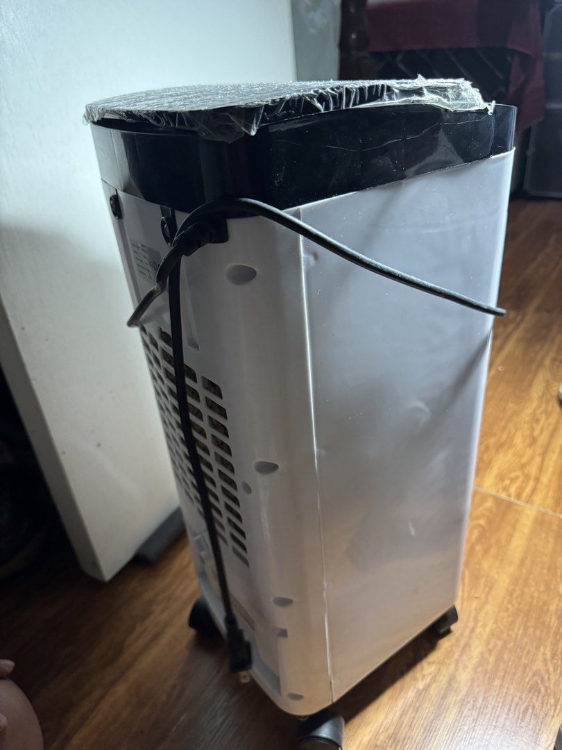 Tixx Portable Air Cooler Fan (Category: Air Conditioning and Heating) located in Santa Rosa. Submitted by d.tfits (Listing ID 1468545650, Image 3). Description: Bought for 1400+ on orange app. Used barely for 2 months. Moved to much smaller space kaya i dont need it na. Loc. Kamuning qc.