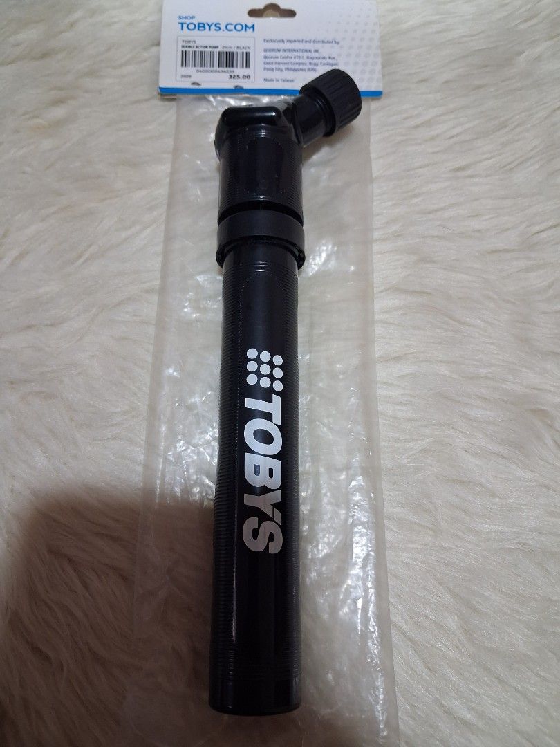 Tobys Double Action Pump 21cm Black (Category: Bicycles) located in Manila. Submitted by jiejieph (Listing ID 1468708002, Image 1). Description: - Brand: Toby's - Item: Double action mini air pump - Size: 21cm, compact and handy - Color: Black - Condition: Brand new, never opened, still in original plastic packaging with cardboard header tag - Ideal for: Inflating sports balls and small inflatables on the go.