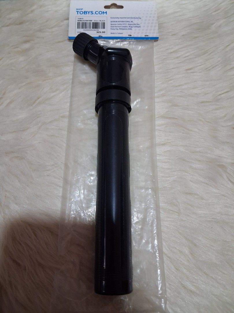 Tobys Double Action Pump 21cm Black (Category: Bicycles) located in Manila. Submitted by jiejieph (Listing ID 1468708002, Image 2). Description: - Brand: Toby's - Item: Double action mini air pump - Size: 21cm, compact and handy - Color: Black - Condition: Brand new, never opened, still in original plastic packaging with cardboard header tag - Ideal for: Inflating sports balls and small inflatables on the go.