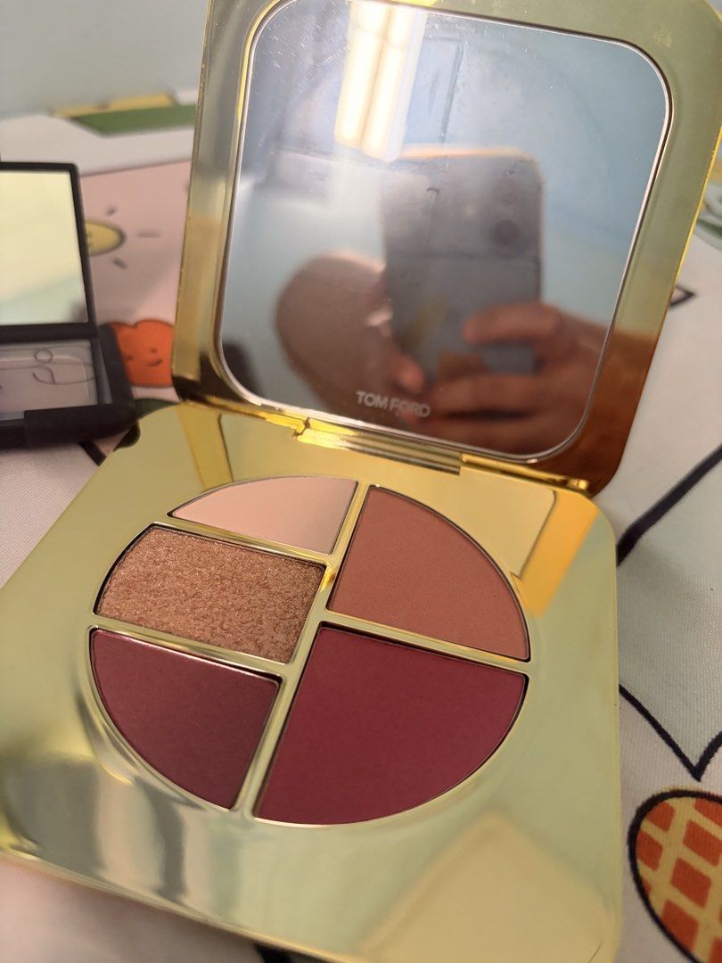 Tom Ford, NARS, and Flower Knows Makeup Palette Bundle (Category: Makeup) located in Tanza. Submitted by orcazairaj47526 (Listing ID 1468634613, Image 3). Description: - Makeup bundle featuring three popular beauty brands - Tom Ford cheek and eye compact with mirror - NARS Man Ray duo eyeshadow in original box with mirror - Flower Knows Strawberry Chocolate heart blush in pink with mirror - Perfect set for makeup lovers and collectors.