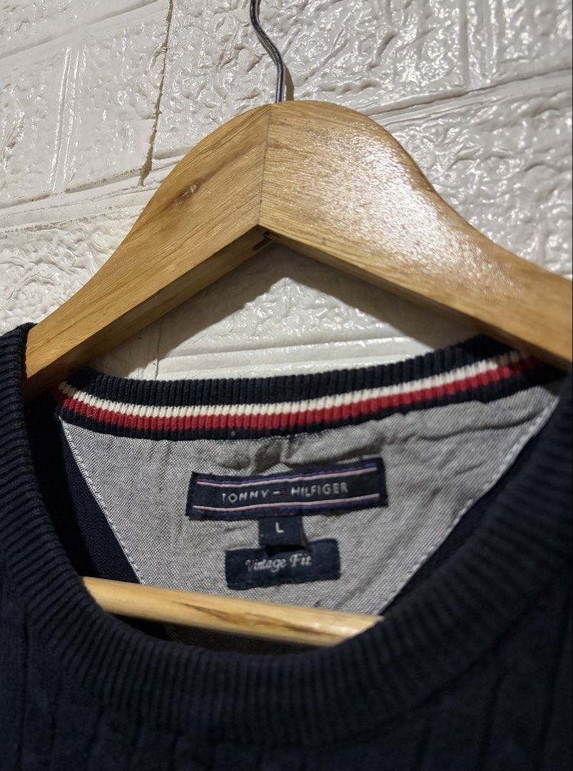 TOMMY HILFEGER KNITTED NAVY BLUE (Category: Coats, Jackets and Outerwear) located in Quezon City. Submitted by chraliskyutie (Listing ID 1468574188, Image 3). Description: Length 26 Width 20 Color Rate 10/10 Asnew Condition Navy Blue NO ISSUE.