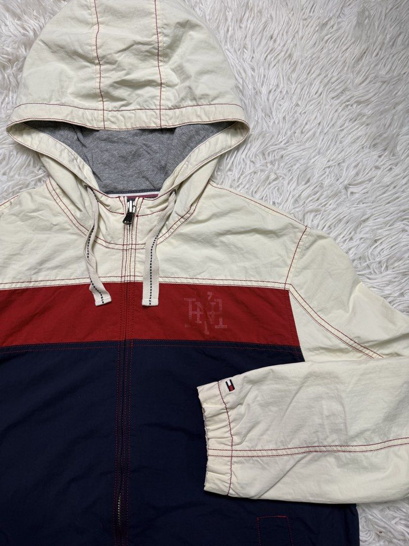 Tommy hilfiger (Category: Coats, Jackets and Outerwear) located in Baguio. Submitted by sellingtonshop (Listing ID 1468524800, Image 3). Description: t14. Tommy Hilfiger tricolor jacket Size: L Dimes: 27*22 Condition: very good Issue: small scratch on left sleeve and dot stains on right shoulder Mine: 780 Steal: 880 Grab: 980.