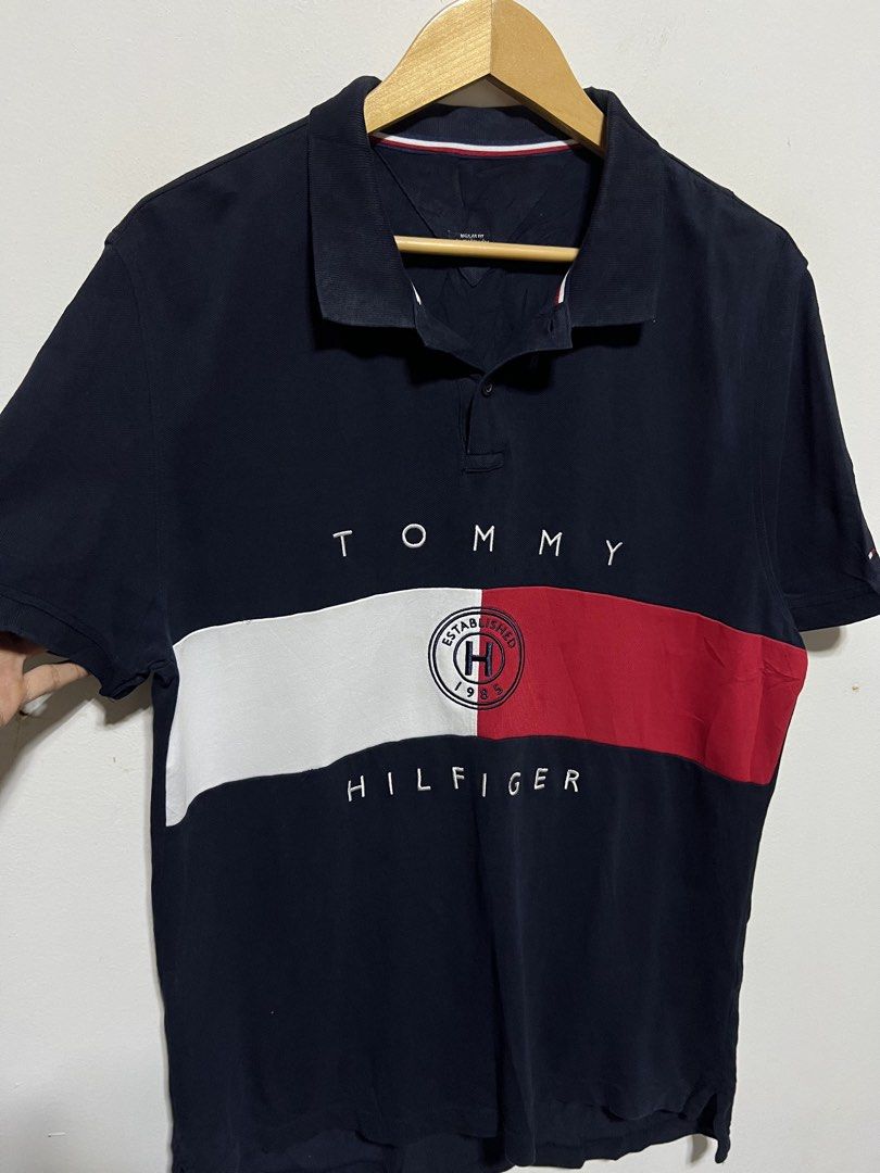 TOMMY HILFIGER BIGLOGO SCRIPT POLO SHIRT (Category: Tshirts & Polo Shirts ) located in Compostela. Submitted by kimoykimoy (Listing ID 1468695183, Image 2). Description: Large Dimension: 22x29 Color rate & Condition: 9.8/10 Issue: None *Cotton Fabrics, Embroidered logo Authentic/Legit ₱299.00 (Plus shipping fee) Location: Compostela, Davao de Oro, Mindanao Disclaimer: Not affiliated with any of the brands or company posted, and this post is not e