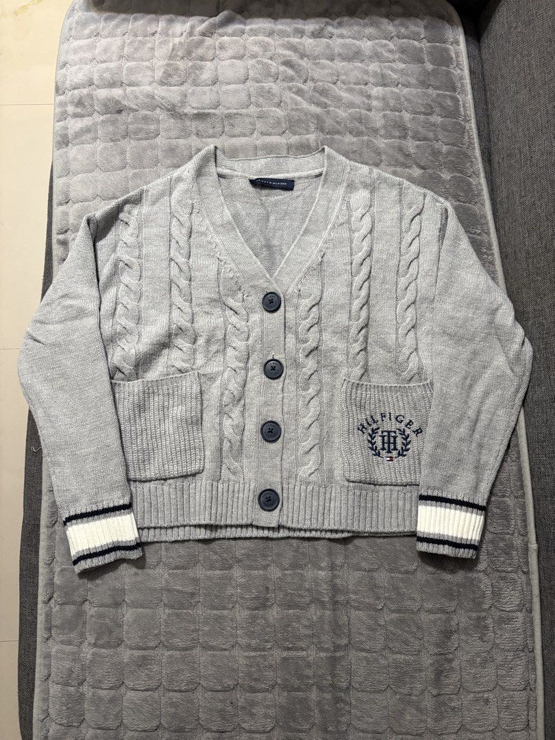 TOMMY HILFIGER CARDIGAN CABLE KNIT (Category: Longsleeves) located in Dasmarinas. Submitted by thrifteverywhere (Listing ID 1468526446, Image 1). Description: Tommy Hilfiger Cardigan Cable Knit Good condition Small to medium.