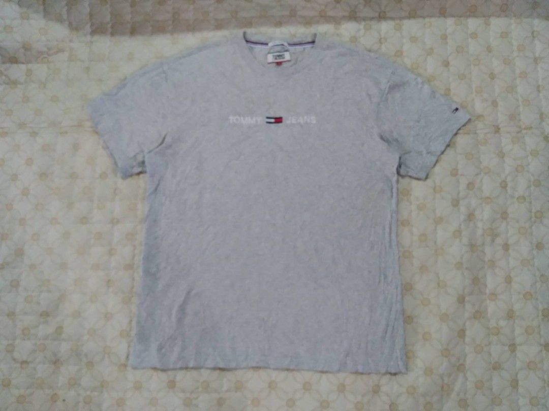 Tommy Hilfiger Grey T-shirt Medium (Category: Tshirts & Polo Shirts ) located in Zamboanga. Submitted by nurbya898048 (Listing ID 1468661323, Image 1). Description: Tag size small best fit to medium Width 20 Length 26 Grey color way Embroidery logo Excellent condition Color rate 9.8/10 Presentable, no flaws Check all photos for details 450+shipping fee.