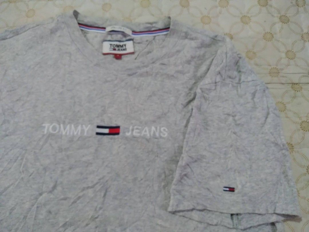 Tommy Hilfiger Grey T-shirt Medium (Category: Tshirts & Polo Shirts ) located in Zamboanga. Submitted by nurbya898048 (Listing ID 1468661323, Image 2). Description: Tag size small best fit to medium Width 20 Length 26 Grey color way Embroidery logo Excellent condition Color rate 9.8/10 Presentable, no flaws Check all photos for details 450+shipping fee.