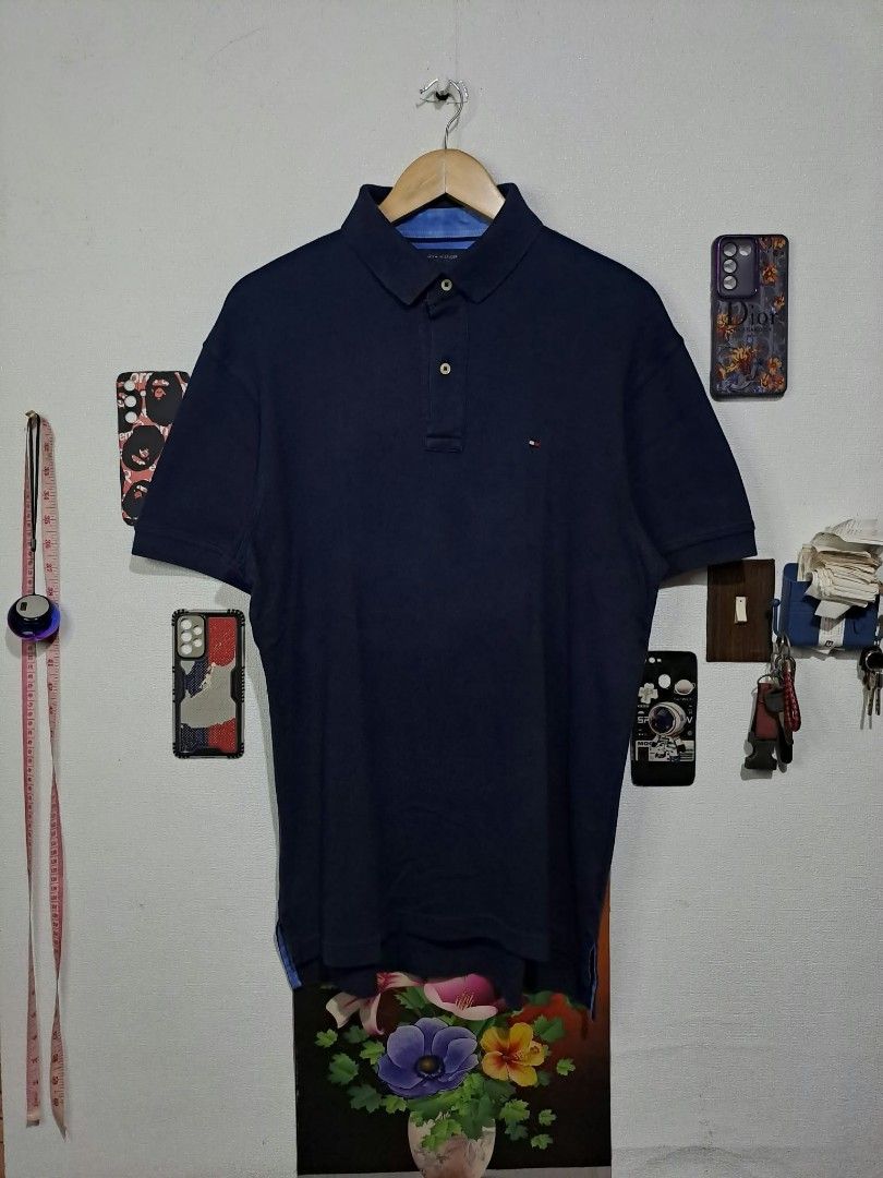 Tommy Hilfiger Navy Blue (Category: Formal Shirts) located in Quezon City. Submitted by yaseen73 (Listing ID 1468709569, Image 1). Description: Tommy Hilfiger Navy Blue Soft Cotton 100% Made in Sri Lanka Wearing Size : Medium on Tags Dimensions : Please Refer to the Photo Color Rate : 9.5/10 ✔️Honest Issue : Color Restored Using Jobus and Bleach Fading - No Pinhole / No Scratch / No Runs - Good Condition 500.00 Shipped MOP : G C A S H B A N K T R
