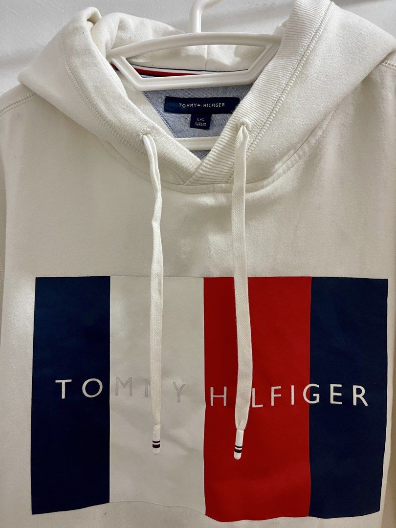 Tommy Hilfiger Off-White Hoodie (Category: Coats, Jackets and Outerwear) located in Santa Rosa. Submitted by odepangilinan (Listing ID 1468507901, Image 2). Description: Classic brand logo block print across the chest. Cozy, clean, and ready to wear..