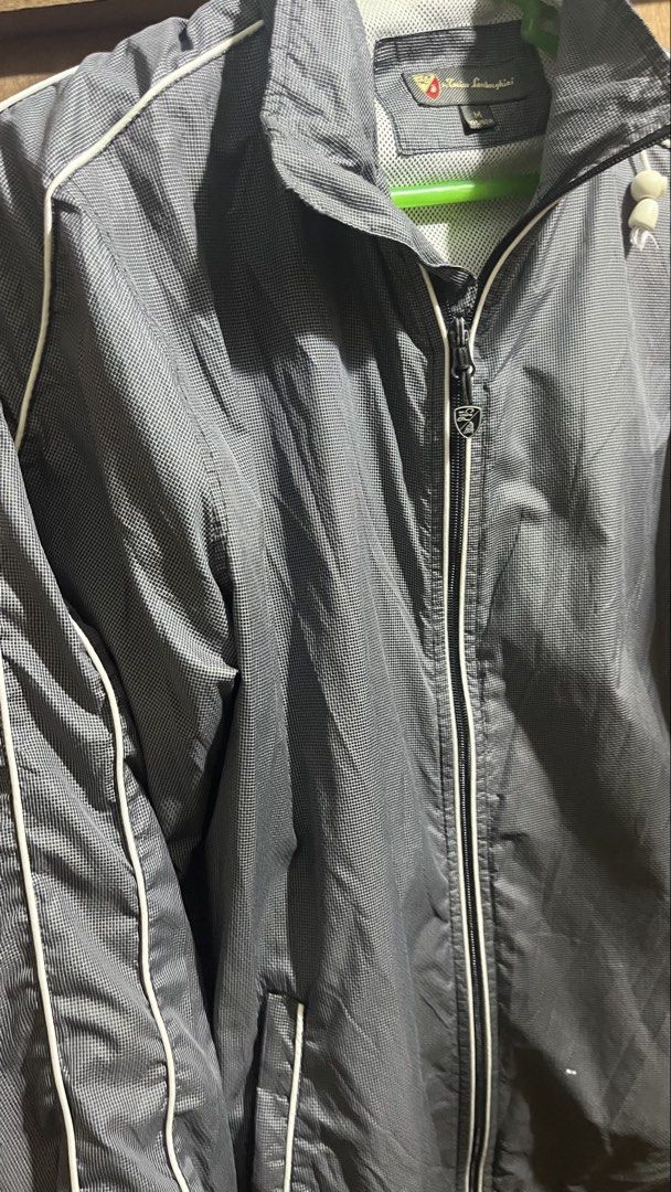 Tonino Lamborghini Full-Zip Lightweight Track Jacket - Dark Grey (M) (Category: Coats, Jackets and Outerwear) located in Taguig. Submitted by aperturestudios.co (Listing ID 1468613331, Image 1). Description: M on tag but can fit to L Color may vary due to lighting Excellent Condition Color Rate: 10/10 No Issue ₱699 + sf.