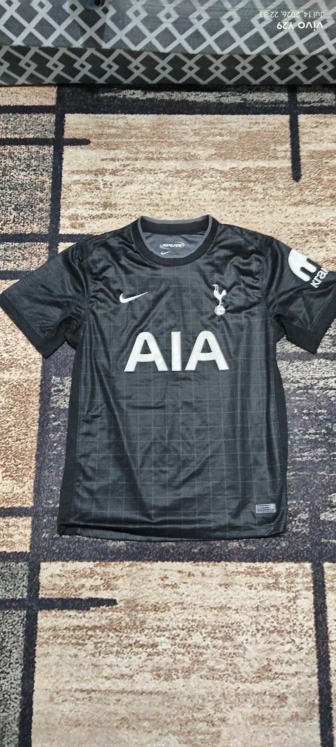 Tottenham Hotspur Away Jersey Son 7 Nike (Category: Activewear) located in Manila. Submitted by ianmontede19006 (Listing ID 1468509111, Image 2). Description: - Official Tottenham Hotspur away football shirt - Striking black grid pattern design - Features 'SON 7' player printing on the back - Authentic Premier League sleeve badge and sleeve sponsor - Iconic AIA chest sponsor, Nike swoosh, and Spurs crest - Includes engineered authenticity tag nea