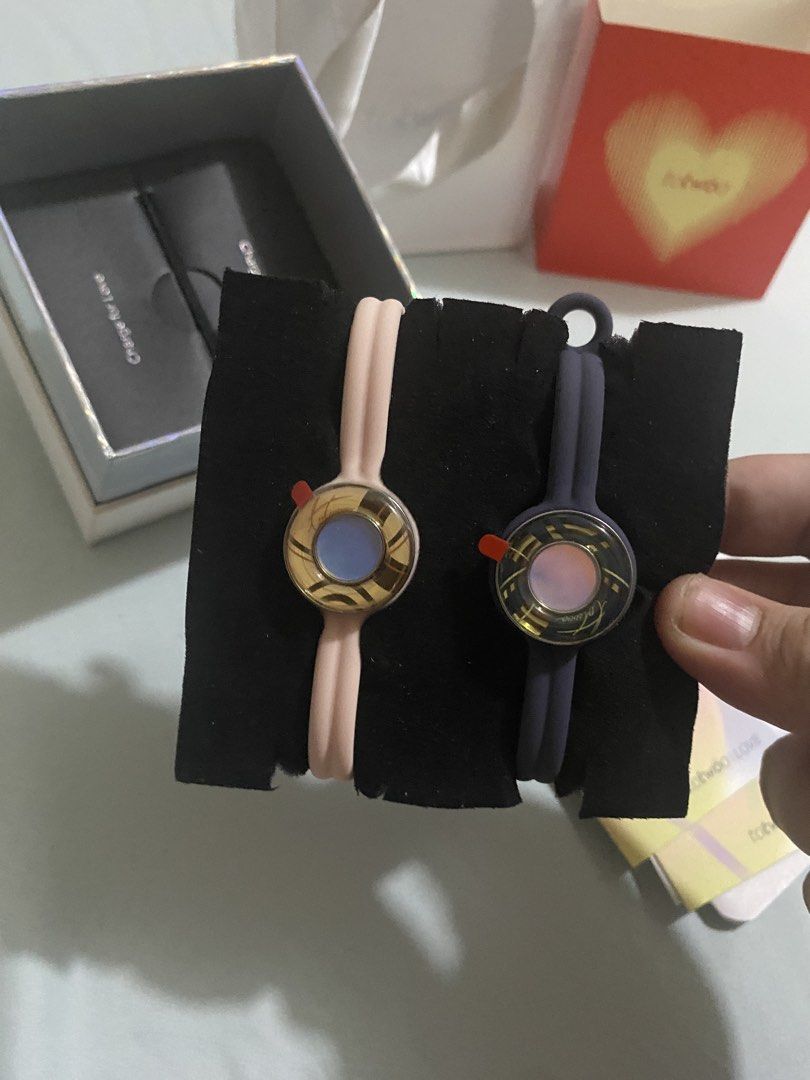 Totwoo Candy Long Distance Touch Bracelets Pair (Category: Bracelets) located in Quezon City. Submitted by niconekoscloset (Listing ID 1468541961, Image 2). Description: DISCLAIMER: BLUE BRACELET IS FULLY FUNCTIONAL, BUT PINK BRACELET IS FAULTY. ONLY PURCHASE IF YOU ARE AWARE! Goes for 4.8k on their website, selling these for 1.5k only! - Totwoo Candy series long-distance touch bracelets for couples - Colors: Pink and dark purple with stylish gol