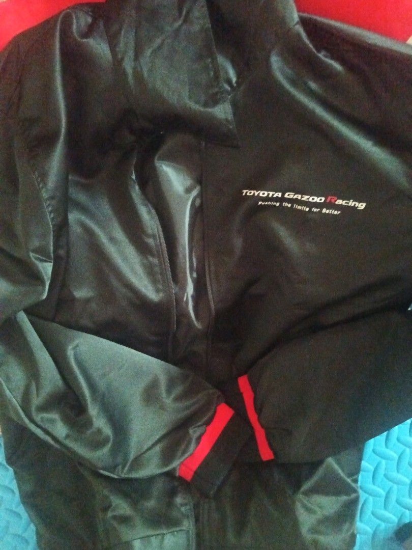 Toyota Gazoo Racing GR Jacket Black Size L (Category: Coats, Jackets and Outerwear) located in Manila. Submitted by kchingx (Listing ID 1468548043, Image 2). Description: - Official Toyota Gazoo Racing merchandise with tag attached - Color: Black with striking red accents on cuffs and zipper trim - Branding: Iconic GR logo featured on the back, chest, and hang tag - Size: Large, unisex fit - Closure: Full-zip front.