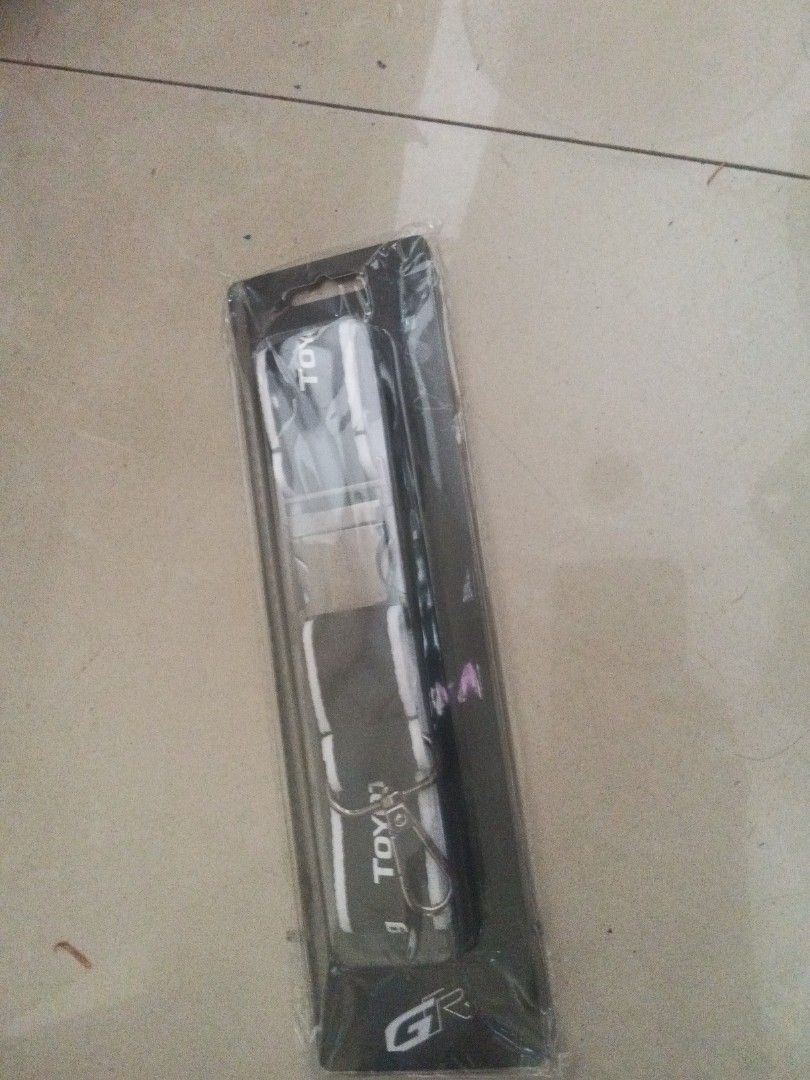 Toyota GR Lanyard TGR19L (Category: Luxury Accessories) located in Manila. Submitted by kchingx (Listing ID 1468547462, Image 1). Description: - Official Toyota Gazoo Racing (TGR) merchandise - Brand new and 100% unopened in original sealed packaging - Stylish black and white strap design with durable metal clip hardware - Includes clear plastic display sleeve with authentic TGR19L product sticker and barcode - Perfect for car keys, ID badges, or