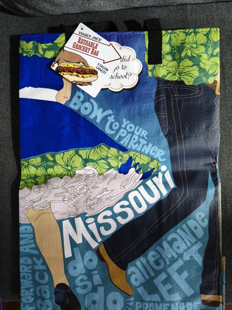 Trader Joe's grocery bag (Category: Tote Bags) located in Pasay City. Submitted by biancabee25 (Listing ID 1468558815, Image 3). Description: brand new with paper tag bought from US back to back design.