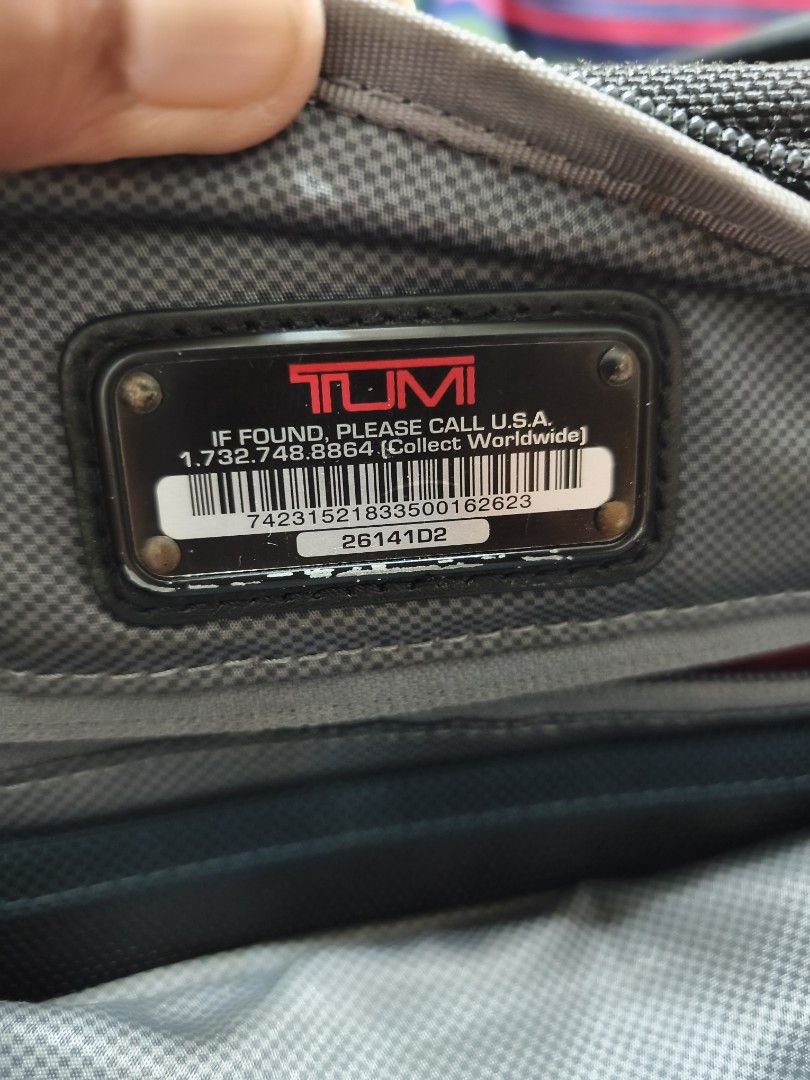 TUMI Alpha 2 Business Briefcase 26141D2 Black (Category: Briefcases) located in Bulacan. Submitted by THA_D_THRIFT (Listing ID 1468527028, Image 3). Description: - Brand/Model: TUMI Alpha 2 Laptop Briefcase (Model 26141D2) - Color/Material: Black FXT Ballistic Nylon with metal branding - Inclusions: Detachable shoulder strap, top handles, and registered TUMI Tracer tag - Features: Multiple zippered compartments, padded laptop section, and smart o
