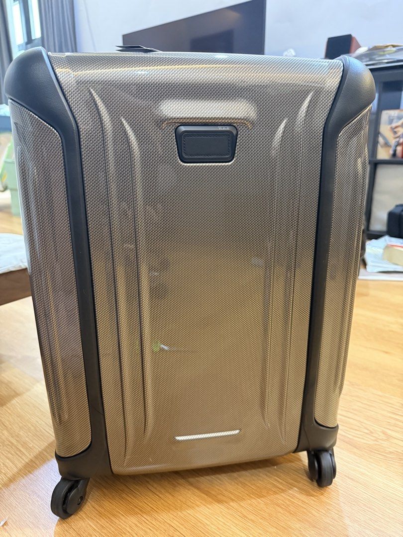 TUMI Luggage Suitcase (Category: Luggage) located in Manila. Submitted by jylesang (Listing ID 1468503300, Image 2). Description: - Brand new with tags attached - Premium TUMI hardside suitcase in a sleek textured grey finish with dark trim - Smooth spinner wheels for effortless mobility - Sturdy telescoping handle and convenient retractable top handle - Large vertical debossed TUMI logo on the rear shell.