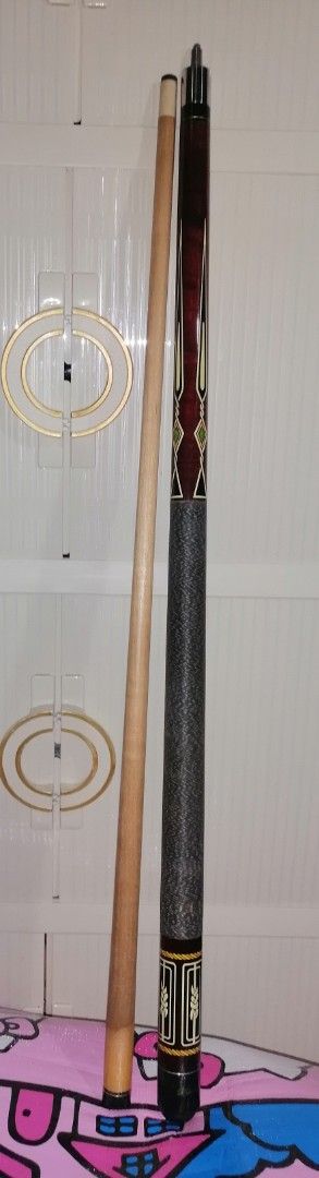 Two-Piece Billiards Cue Stick with Carrying Case (Category: Billiards and Bowling) located in Quezon City. Submitted by rolenalma (Listing ID 1468551102, Image 3). Description: - Two-piece wooden cue stick with a secure center pin joint - Features a stylish textured grip area and classic decorative points - Includes a durable black faux-leather carrying case with a convenient shoulder strap and zipped pocket - Comes with a bonus small piece of re