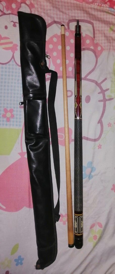 Two-Piece Billiards Cue Stick with Carrying Case (Category: Billiards and Bowling) located in Quezon City. Submitted by rolenalma (Listing ID 1468551102, Image 2). Description: - Two-piece wooden cue stick with a secure center pin joint - Features a stylish textured grip area and classic decorative points - Includes a durable black faux-leather carrying case with a convenient shoulder strap and zipped pocket - Comes with a bonus small piece of re