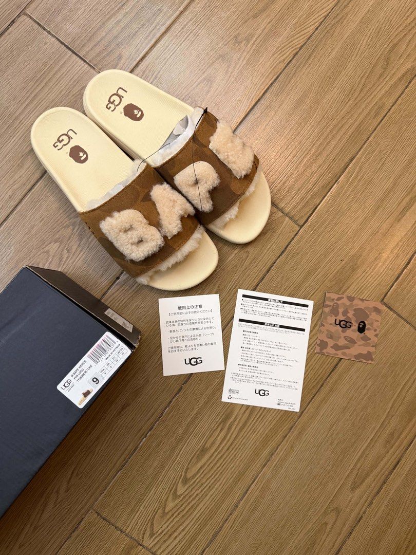 UGG x BAPE M BAPE XAVIER FUR LOGO Slides (Category: Slippers & Slides) located in Manila. Submitted by sleamdaily222 (Listing ID 1468708041, Image 3). Description: - Item: UGG x BAPE Collaboration Slides - Colorway: Brown Camouflage with Off-White Footbed - Size: US Men's 9 / UK 8 / EU 42 / JP 27 - Features: Fluffy shearling 'BAPE' logo across strap and co-branded footbed details - Inclusion: Complete with original box, tags, and care cards - Con