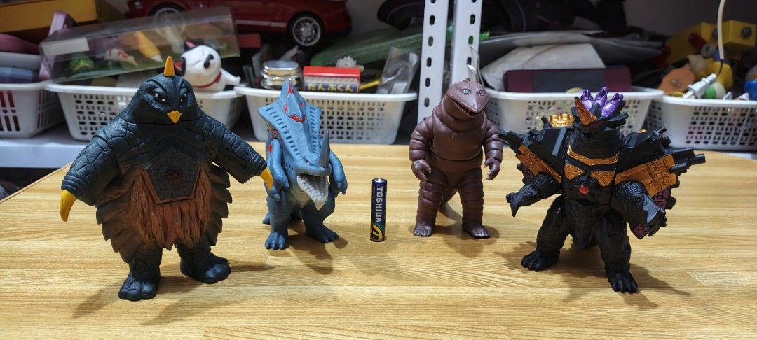 Ultraman Kaiju Sofubi Vinyl Figures Set of 4 (Category: Figurines & Statues) located in San Pedro. Submitted by toydibz (Listing ID 1468534022, Image 1). Description: - Set includes 4 detailed Ultraman monster vinyl figures - Features intricate sculpts and vibrant paint apps - Figures stand securely on their own - Perfect addition to any tokusatsu monster collection - Size reference shown next to a standard AA battery.