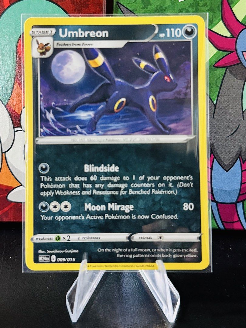 Umbreon 009/015 (Category: Raw Singles) located in Bacarra. Submitted by retrovival (Listing ID 1468709336, Image 1). Description: 🌙 Umbreon 009/015 — M24EN Umbreon under the moonlight! This McDonald’s Pokémon promo features 110 HP, Blindside, and Moon Mirage. ₱100 — negotiable. Selling by piece. Message me if interested! 📩.