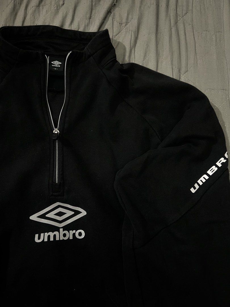 Umbro Black Quarter-Zip Sweater (Category: Coats, Jackets and Outerwear) located in Cagayan de Oro. Submitted by thrift4all (Listing ID 1468572814, Image 2). Description: In very good condition No issue Color rate 9/10 Complete tags Size XL.