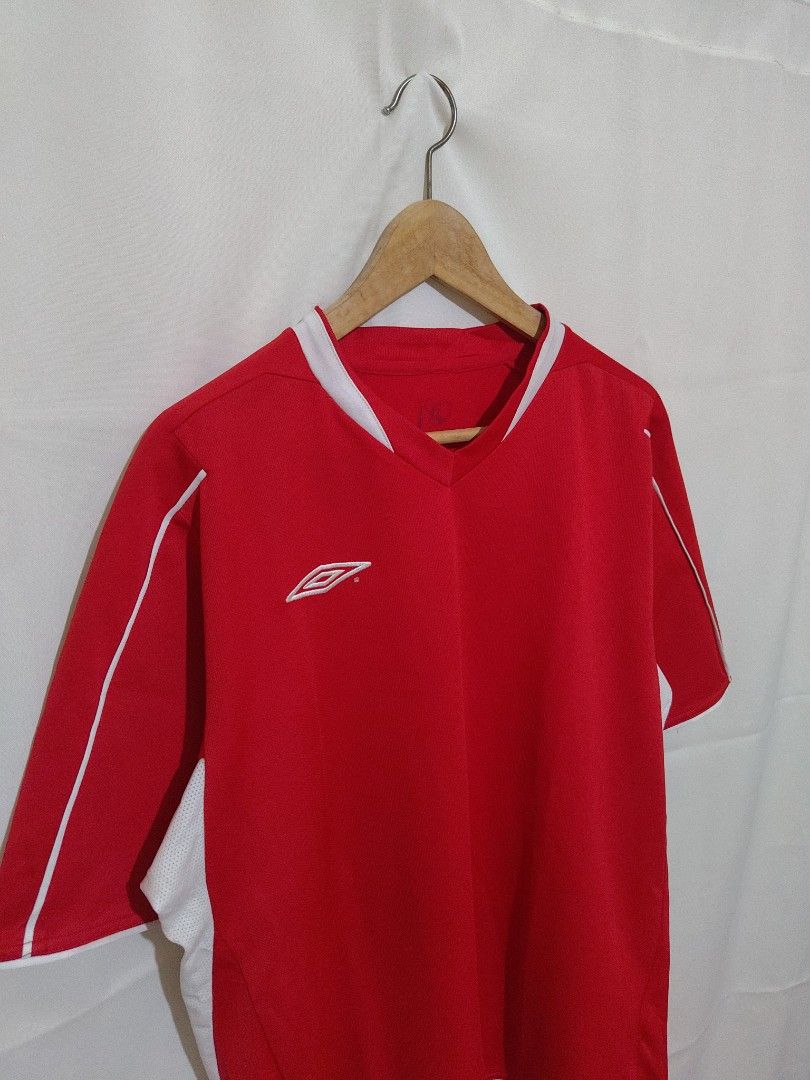 Umbro Drifit Shirt (Category: Activewear) located in Bacolod City. Submitted by xvespe (Listing ID 1468693157, Image 2). Description: Size: XL Condition: Well Used Flaw: SOA Width: 22" Length: 28-29" Color may vary due to lighting. Measurements were taken pit to pit in a flat-lay position. Please compare to your already owned garments to avoid confusion and further hassle..
