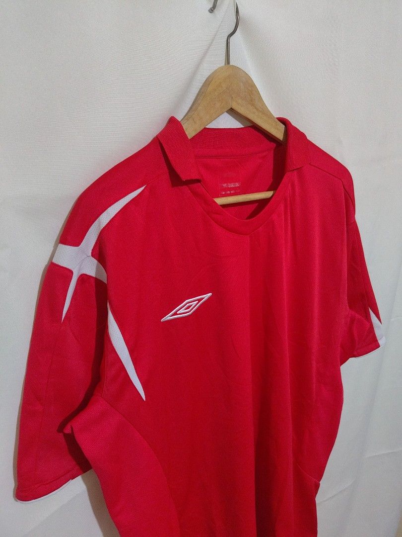 Umbro Drifit Shirt (Category: Activewear) located in Bacolod City. Submitted by xvespe (Listing ID 1468693938, Image 2). Description: Size: XL Condition: Heavily Used Flaw: SOA Width: 24" Length: 29-30.5" Color may vary due to lighting. Measurements were taken pit to pit in a flat-lay position. Please compare to your already owned garments to avoid confusion and further hassle..