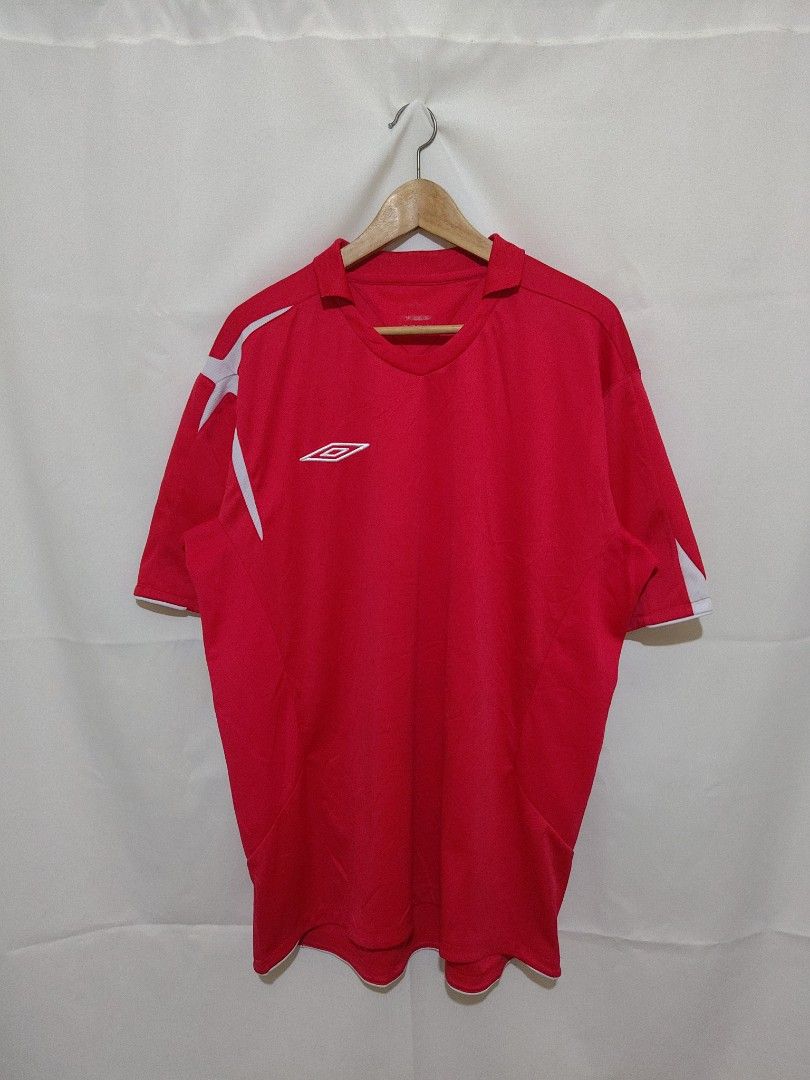 Umbro Drifit Shirt (Category: Activewear) located in Bacolod City. Submitted by xvespe (Listing ID 1468693938, Image 1). Description: Size: XL Condition: Heavily Used Flaw: SOA Width: 24" Length: 29-30.5" Color may vary due to lighting. Measurements were taken pit to pit in a flat-lay position. Please compare to your already owned garments to avoid confusion and further hassle..