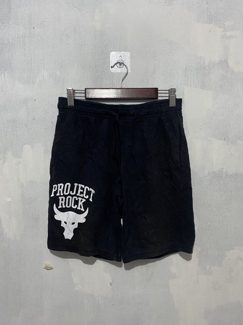 Under Armour Project Rock Sweatshort (Category: Activewear) located in Bulacan. Submitted by _myarchive (Listing ID 1468639252, Image 1). Description: Large yourh Waist 26-30 lwngth 17 uneven fade sa hita goodcondi needwash fresh from bale may guhit na dumi sa design pero walang sira .