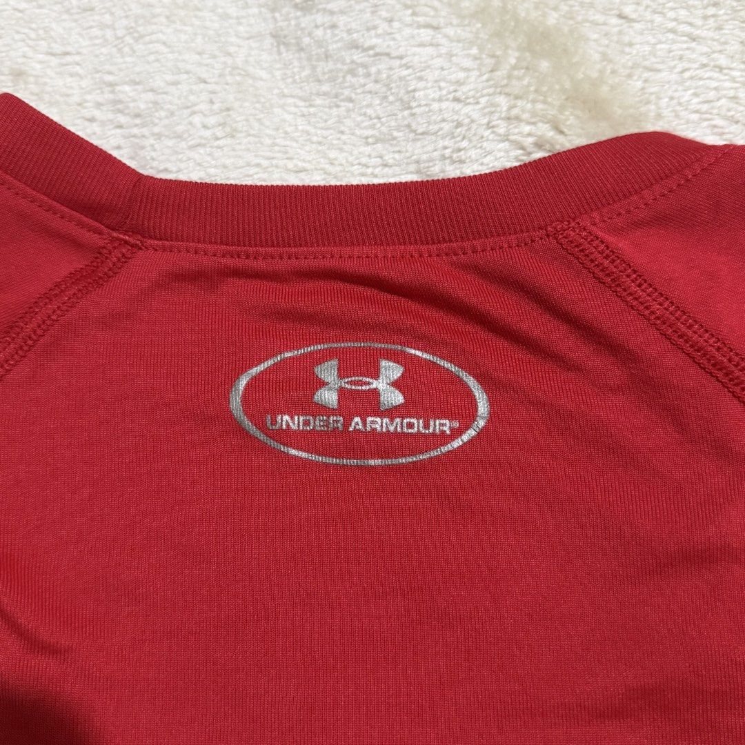 Under Armour Red Athletic T-Shirt (Category: Shirts) located in Pasay City. Submitted by bellita_05 (Listing ID 1468554272, Image 2). Description: Authentic-looking Under Armour red sports tee with a classic white logo. Lightweight athletic style, perfect for gym workouts, running, sports, or casual everyday wear. ✨ Colour: Red ✨ Brand: Under Armour ✨ Style: Athletic / Sports T-shirt ✨ Fit: Classic sporty fit ✨ Condition: Pre-loved.