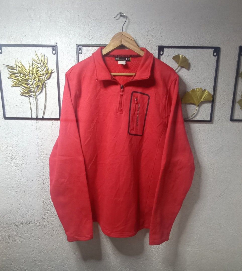 Under Armour Red Quarter-Zip Fleece Pullover (Category: Coats, Jackets and Outerwear) located in Kawit. Submitted by deidzdzn (Listing ID 1468555715, Image 3). Description: - Brand: Under Armour - Color: Bright red - Size: Tagged L, fits like XL (Chest: 25 inches, Length: 28 inches) - Material: Soft fuzzy fleece interior for maximum warmth - Features: Quarter-zip design with high collar and a handy zippered chest pocket with UA lettering.
