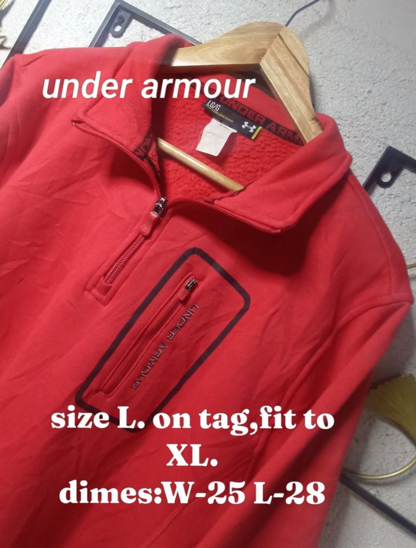 Under Armour Red Quarter-Zip Fleece Pullover (Category: Coats, Jackets and Outerwear) located in Kawit. Submitted by deidzdzn (Listing ID 1468555715, Image 1). Description: - Brand: Under Armour - Color: Bright red - Size: Tagged L, fits like XL (Chest: 25 inches, Length: 28 inches) - Material: Soft fuzzy fleece interior for maximum warmth - Features: Quarter-zip design with high collar and a handy zippered chest pocket with UA lettering.