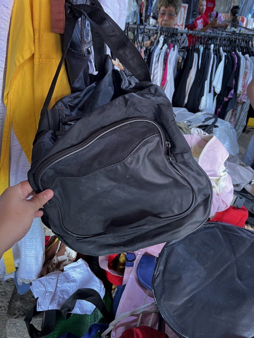 Under Armour Storm Duffle Bag Black (Category: Sling Bags) located in Calabanga. Submitted by jijithriftcamarinessur (Listing ID 1468507202, Image 2). Description: - Authentic Under Armour duffle bag in sleek black with silver logo - UA Storm technology delivers an element-battling, highly water-resistant finish - Spacious zippered main compartment and extra zippered side pocket - Dual carry handles and adjustable webbed shoulder strap with textu