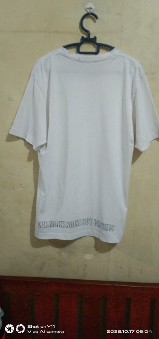 UNDERCOVER Jun Takahashi T-Shirt (Category: Activewear) located in Quezon City. Submitted by okeykathrift (Listing ID 1468523557, Image 2). Description: Jun Takahashi Undercover t-shirt Size: Medium (Fits small to large) Dimensions: 27 in (length from shoulder to waist) / 19 in (body width) Issues: Small dot stains at the bottom side of t-shirt. Not noticeable from a distance. Still in good condition.