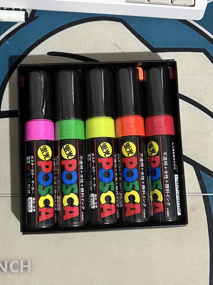 Uni POSCA PC-8K Fluorescent 5-Color Marker Set (Category: Craft Supplies & Tools) located in Mandaluyong City. Submitted by ronohuntschase (Listing ID 1468626647, Image 1). Description: - Brand: Uni POSCA - Model: PC-8K (8mm broad chisel tip) - Set of 5 vibrant neon colors: pink, green, yellow, orange, and red - Water-based pigment ink writes smoothly on paper, metal, plastic, and glass - Condition: Unused in original box - Sealed markers, Opened