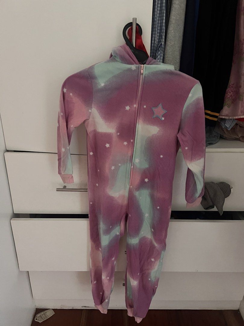 Unicorn Hooded Onesie Pyjamas (Category: Babies & Kids Fashion) located in Manila. Submitted by asecondstory (Listing ID 1468502003, Image 2). Description: - Super soft fleece fabric for ultimate comfort - Dreamy pink, purple, and mint tie-dye with white star pattern - Attached 3D hood with embroidered unicorn eyes, horn, mane, and ears - Cute pink star applique on the chest - Easy front full zipper closure - Ribbed cuffs at wrists and ankles to 
