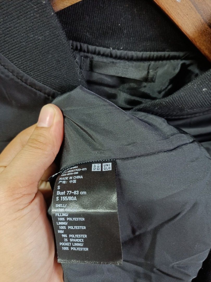 Uniqlo Black Bomber Jacket Size S (Category: Coats, Jackets and Outerwear) located in Bayombong. Submitted by rheaaa00530 (Listing ID 1468625316, Image 2). Description: - Brand: Uniqlo - Style: Classic black bomber jacket with zip-up front - Size: S (fits bust 77-83 cm) - Material: 100% polyester shell, filling, and lining; 98% polyester, 2% spandex ribbing - Features: Two side pockets, ribbed collar, cuffs, and hem - Condition: Clean, simple, an