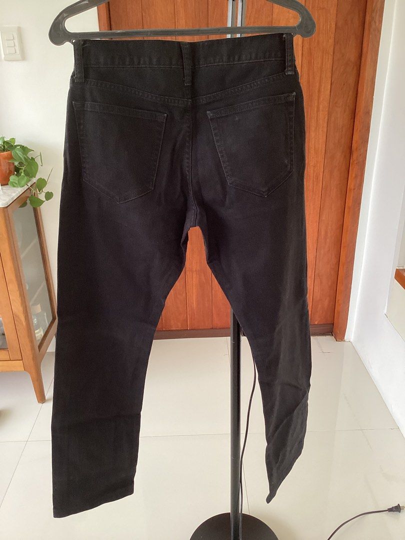 Uniqlo Black Jeans Size 29 (73cm) (Category: Jeans) located in Bacoor. Submitted by cts217 (Listing ID 1468508672, Image 2). Description: - Brand: Uniqlo - Color: Clean dark black wash - Size: JP 29 (73cm) / CN 165/72A - Material: 97% cotton, 3% spandex/elastane for comfortable stretch - Fit: Standard fit - Details: Classic five-pocket design with button fly - Condition: Excellent pre-loved/ready to wear.
