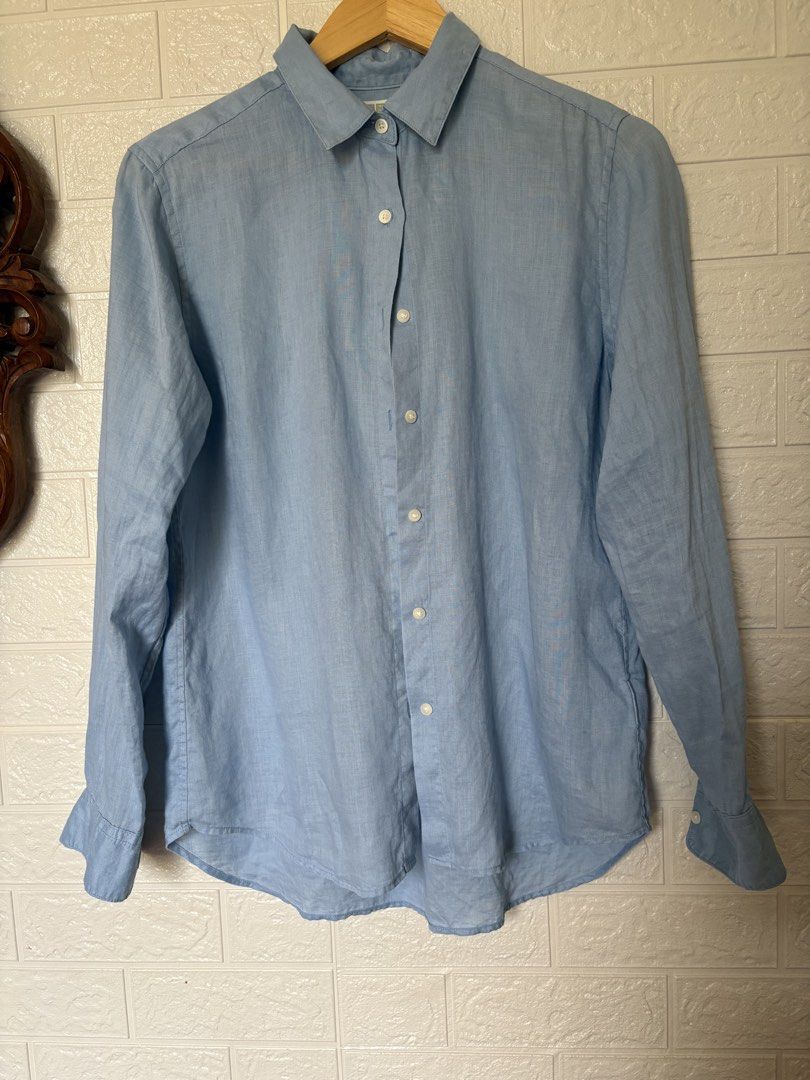 Uniqlo Blue Linen Button Down 100%Linen (Category: Longsleeves) located in Batangas. Submitted by purple_and_orange (Listing ID 1468516595, Image 1). Description: - Brand/Model: Uniqlo long sleeve shirt - Color: Light blue - Material: 100% pure linen - Size: S (tag on collar) - Features: Standard button-up front, classic collar, lightweight fabric with natural texture - Style: Great basic for casual or smart casual outfits.