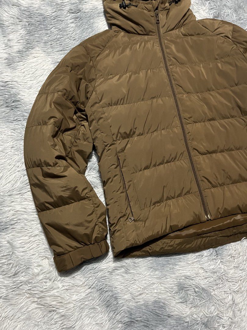 Uniqlo Down Puffer Jacket (Category: Coats, Jackets and Outerwear) located in Sasmuan (Sexmoan). Submitted by winterclothes.ph (Listing ID 1468526328, Image 3). Description: Uniqlo Down Puffer Jacket L on tag Width 23 Length 25-26 Excellent Condition.