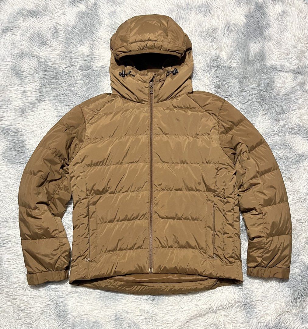 Uniqlo Down Puffer Jacket (Category: Coats, Jackets and Outerwear) located in Sasmuan (Sexmoan). Submitted by winterclothes.ph (Listing ID 1468526328, Image 1). Description: Uniqlo Down Puffer Jacket L on tag Width 23 Length 25-26 Excellent Condition.