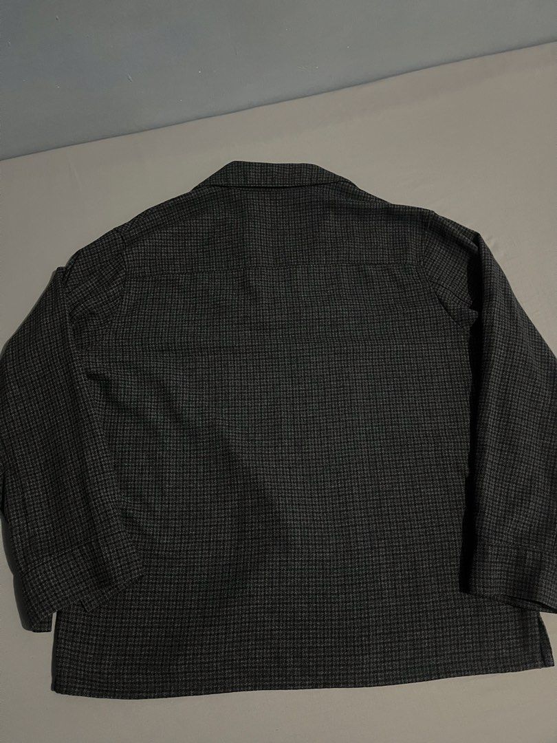 Uniqlo Gray Houndstooth Overshirt Jacket (Category: Coats, Jackets and Outerwear) located in Taguig. Submitted by csthejustin (Listing ID 1468659227, Image 3). Description: - Unisex - Size: Small (S) - Collar: Classic lapel collar with front button closure - Pockets & Cuffs: Single chest pocket and button cuffs - Details: Dark interior lining, clean pattern, and neat stitching - Style: Simple and versatile layering piece for cooler days *Check ou