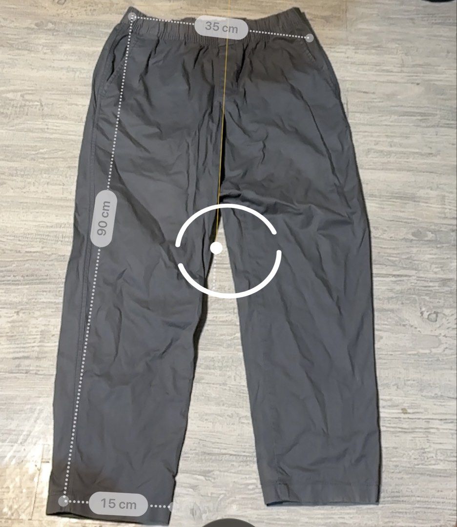 Uniqlo Grey Easy Pants Size S (Category: Trousers) located in Manila. Submitted by d.scab (Listing ID 1468594461, Image 2). Description: - Brand/Model: Uniqlo Easy Pants - Color: Dark Grey - Size: S (Waist fits 68 to 76 cm) - Material: 98% cotton, 2% spandex (slightly stretchy) - Features: Elastic waistband with adjustable drawstring, two side pockets - Measurements: 35 cm across waist, 90 cm total length, 15 cm leg opening - Condition/Use: Great