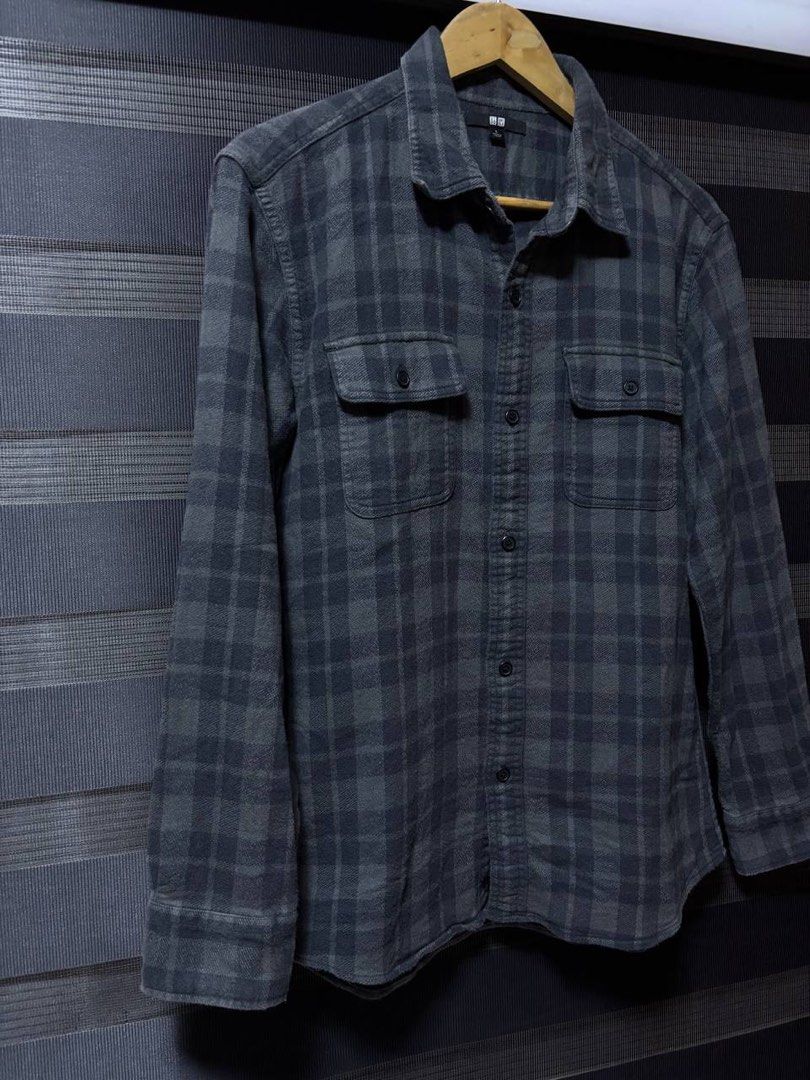 Uniqlo Grey Utility Overshirt (Category: Tshirts & Polo Shirts ) located in Pasig City. Submitted by abogadosupremo (Listing ID 1468629539, Image 3). Description: - Brand: Uniqlo - Utility Overshirt - Color/Pattern: Grey and black plaid - Size: L - Features: Button-down front, two chest pockets, buttoned cuffs - Material: Soft cotton (great for daily wear or layering) - Condition: Clean, well-kept - 100% Legit and Authentic - Very Good Condition 