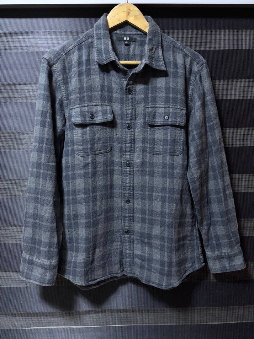 Uniqlo Grey Utility Overshirt (Category: Tshirts & Polo Shirts ) located in Pasig City. Submitted by abogadosupremo (Listing ID 1468629539, Image 1). Description: - Brand: Uniqlo - Utility Overshirt - Color/Pattern: Grey and black plaid - Size: L - Features: Button-down front, two chest pockets, buttoned cuffs - Material: Soft cotton (great for daily wear or layering) - Condition: Clean, well-kept - 100% Legit and Authentic - Very Good Condition 