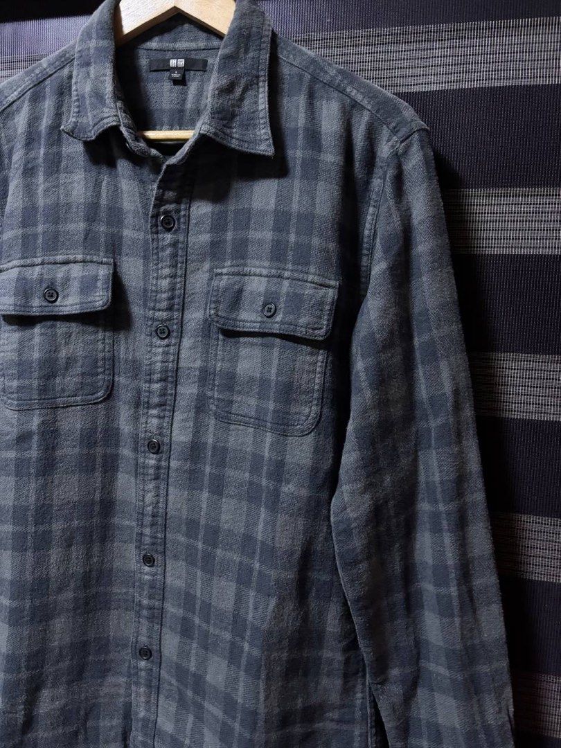 Uniqlo Grey Utility Overshirt (Category: Tshirts & Polo Shirts ) located in Pasig City. Submitted by abogadosupremo (Listing ID 1468629539, Image 2). Description: - Brand: Uniqlo - Utility Overshirt - Color/Pattern: Grey and black plaid - Size: L - Features: Button-down front, two chest pockets, buttoned cuffs - Material: Soft cotton (great for daily wear or layering) - Condition: Clean, well-kept - 100% Legit and Authentic - Very Good Condition 